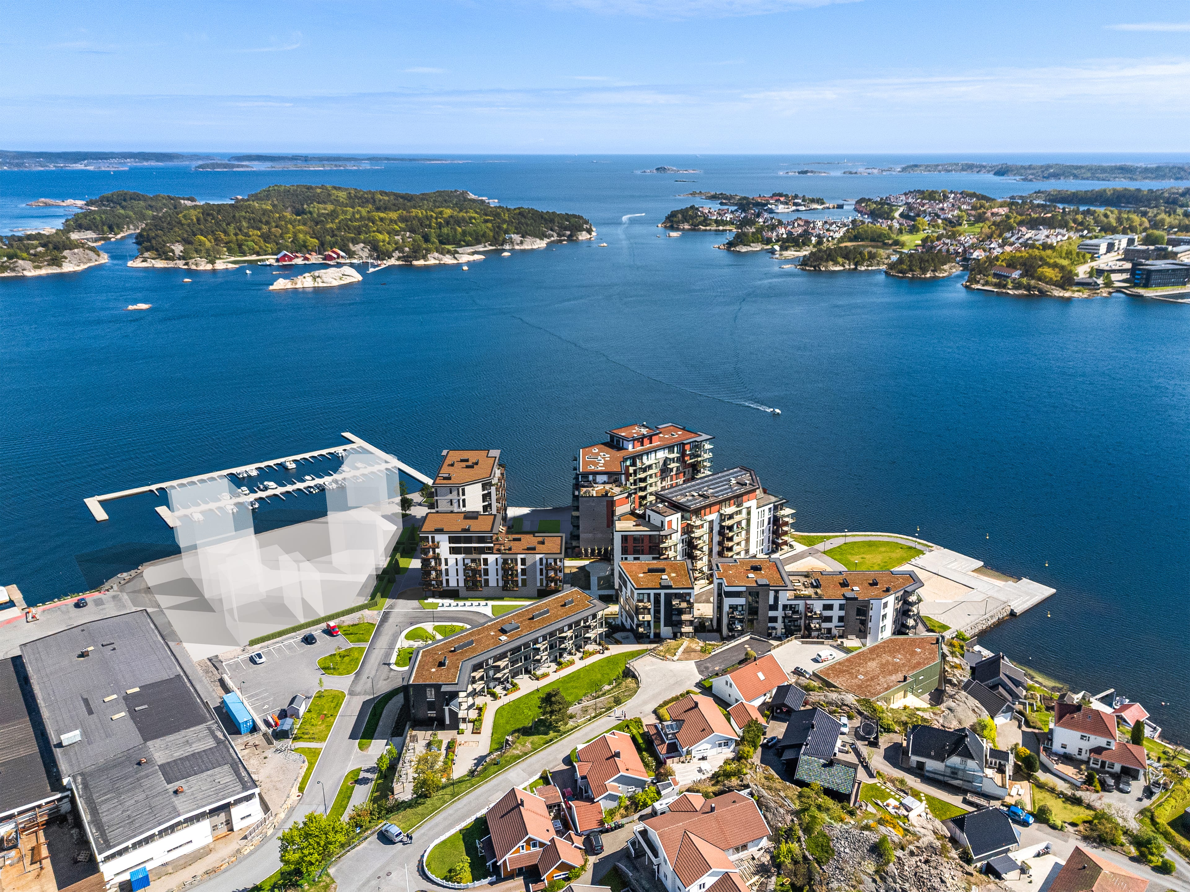 Amalienborg Brygge sett fra sjøen, med bygg F og G og skjærgården i bakgrunnen